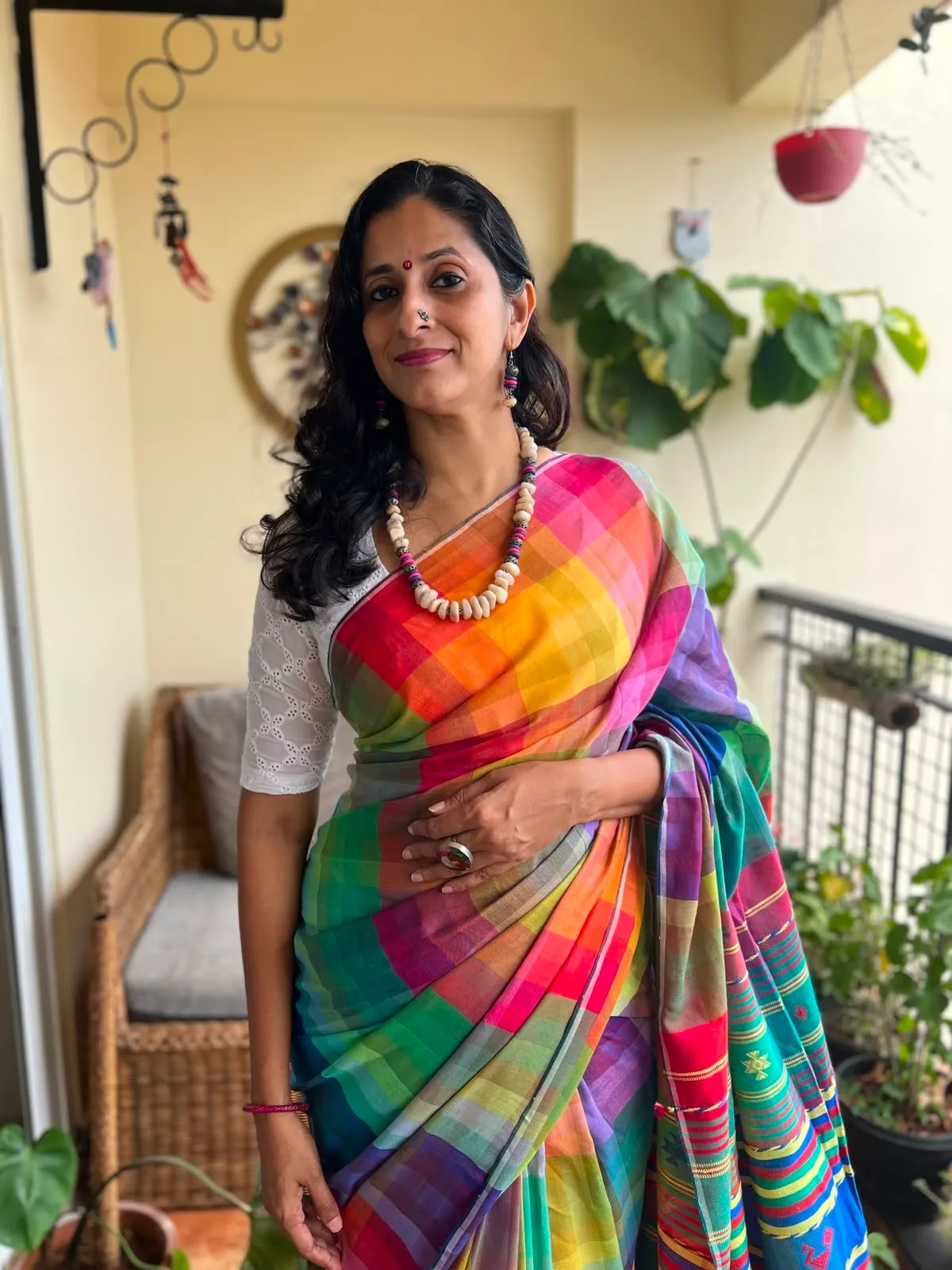 Renu at home in a handloom saree